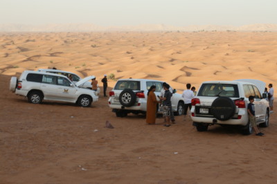 Our drivers allowing their cars to cool off from the dune bashing while offering us photo ops.